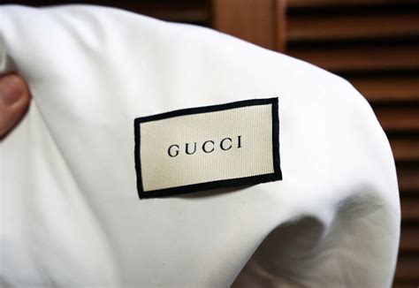 big fake gucci logo|authentic gucci clothing tags.